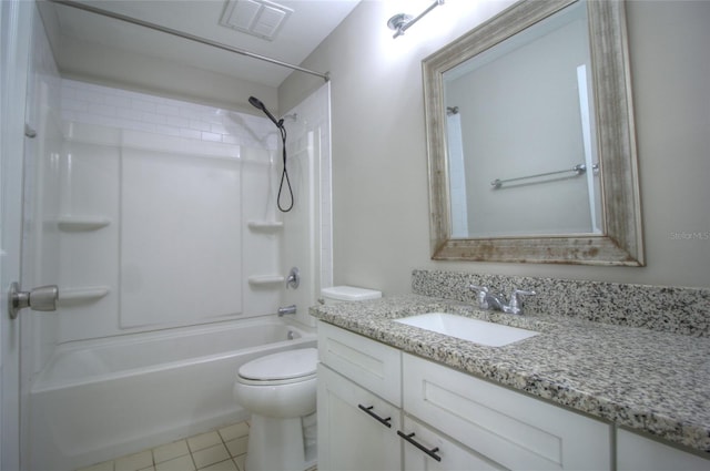 full bathroom featuring vanity, bathtub / shower combination, tile patterned floors, and toilet