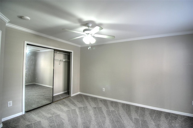 unfurnished bedroom with light carpet, crown molding, a closet, baseboards, and ceiling fan