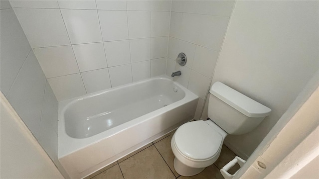 bathroom with tile patterned flooring and toilet