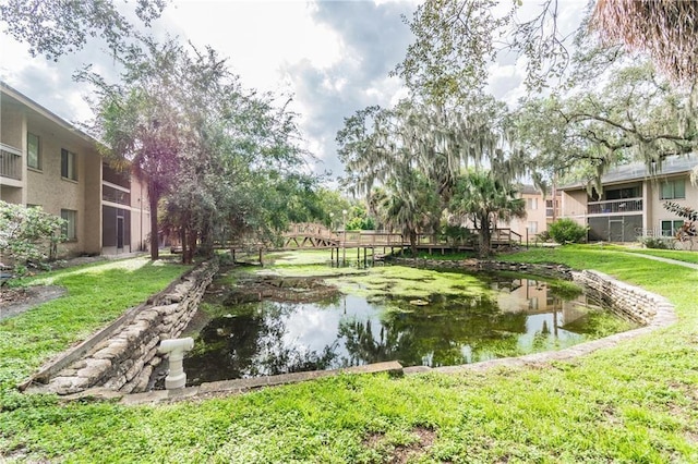 surrounding community featuring a lawn