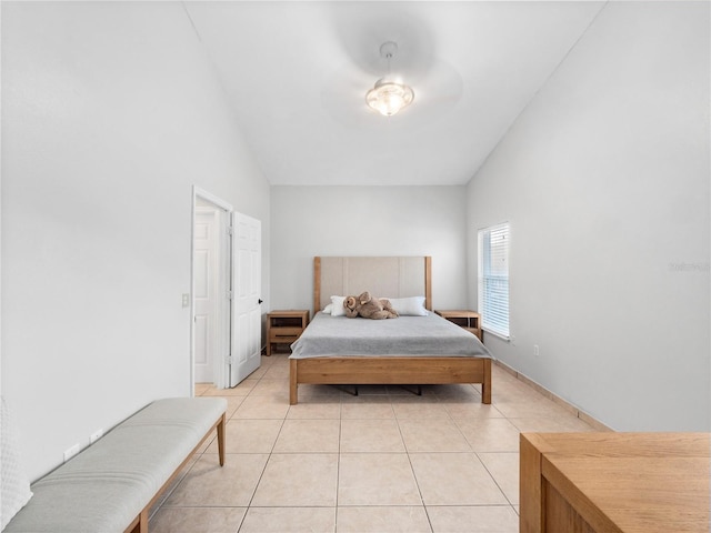 bedroom with light tile patterned flooring