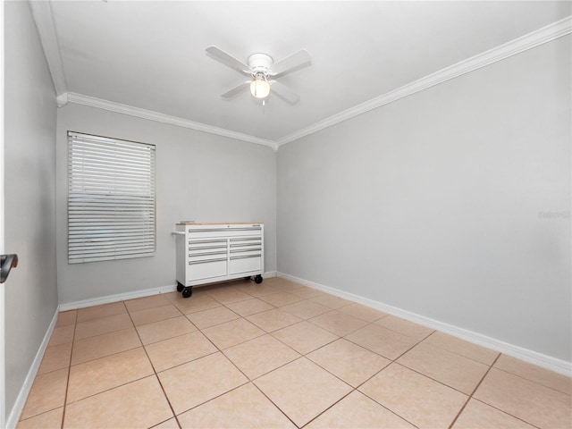 unfurnished room with light tile patterned floors, ornamental molding, and ceiling fan