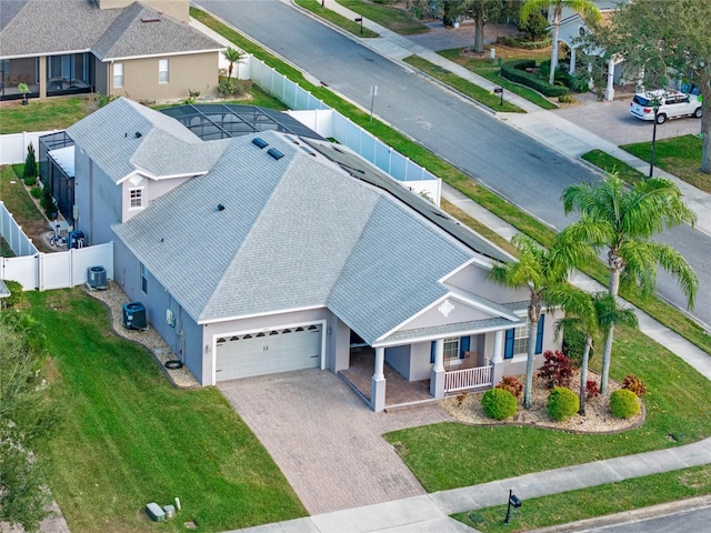 birds eye view of property with a residential view