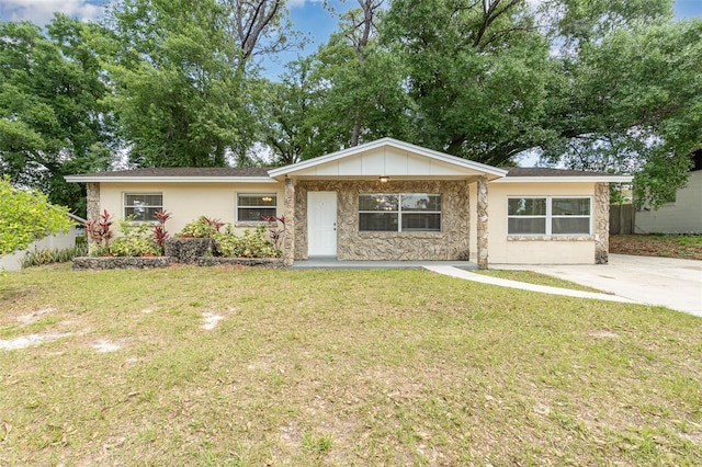 ranch-style home with a front yard