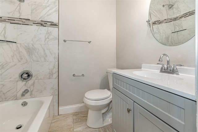 full bathroom with vanity, toilet, and tiled shower / bath combo