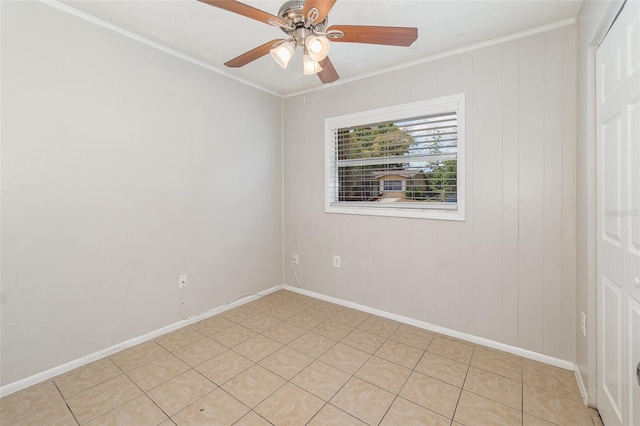 unfurnished room featuring crown molding and ceiling fan