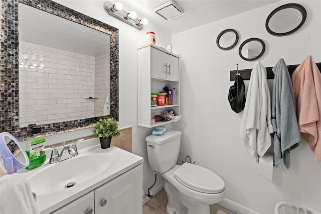 5201 Vineland Rd Unit 112, Orlando, FL 32811 - full bathroom with vanity, tile patterned flooring, and toilet