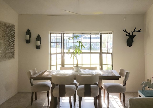 view of tiled dining space