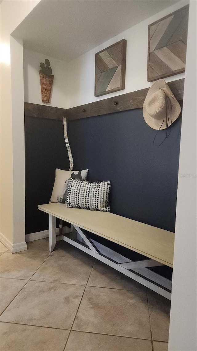 mudroom with tile patterned floors