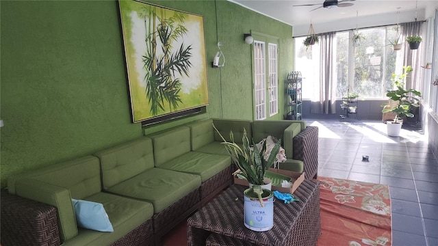 interior space featuring tile patterned floors and ceiling fan