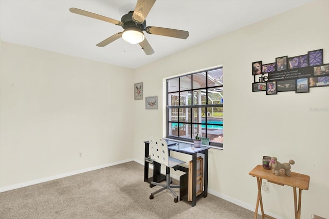 11419 Donneymoor Dr, Riverview, FL 33569 - carpeted home office with a ceiling fan and baseboards