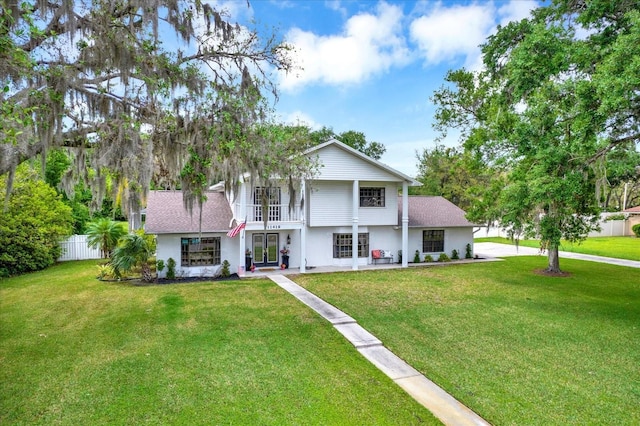 11419 Donneymoor Dr, Riverview, FL 33569 - view of front of house featuring french doors, stucco siding, and a shingled roof