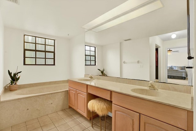 11419 Donneymoor Dr, Riverview, FL 33569 - bathroom with ensuite bath, double vanity, tile patterned flooring, and a bath
