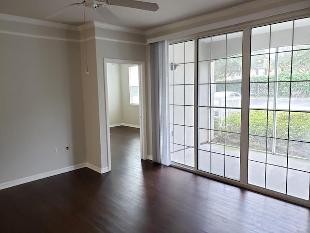 unfurnished room featuring ceiling fan, ornamental molding, and dark hardwood / wood-style flooring