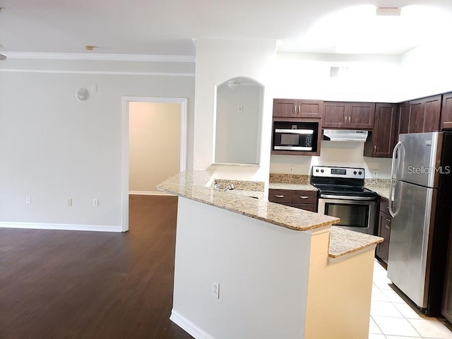 kitchen with light stone counters, kitchen peninsula, stainless steel appliances, crown molding, and light hardwood / wood-style flooring