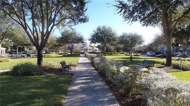 surrounding community featuring a lawn