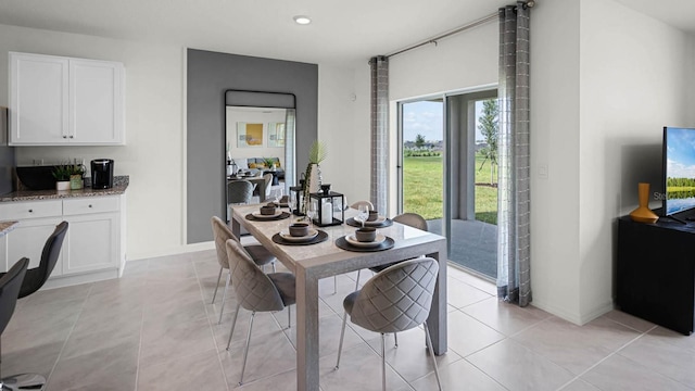 view of tiled dining space