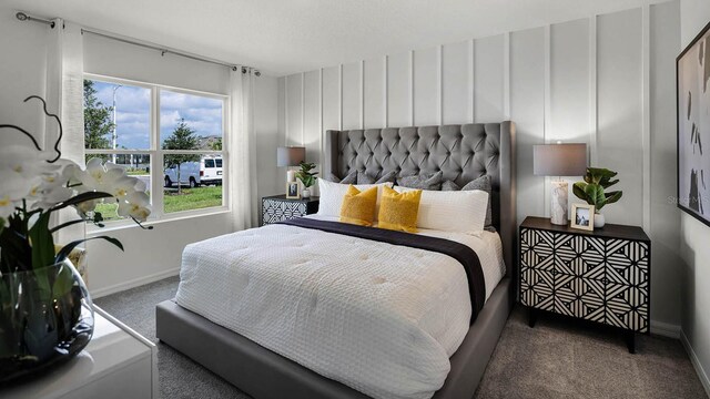 carpeted bedroom featuring multiple windows