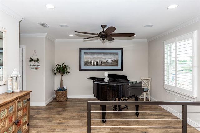 home office with baseboards, visible vents, wood finished floors, crown molding, and recessed lighting