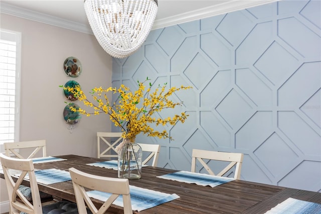 dining space with ornamental molding, a decorative wall, and a notable chandelier