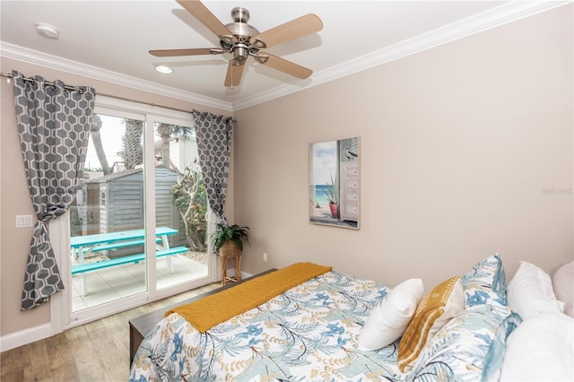 bedroom with access to exterior, crown molding, ceiling fan, wood finished floors, and baseboards