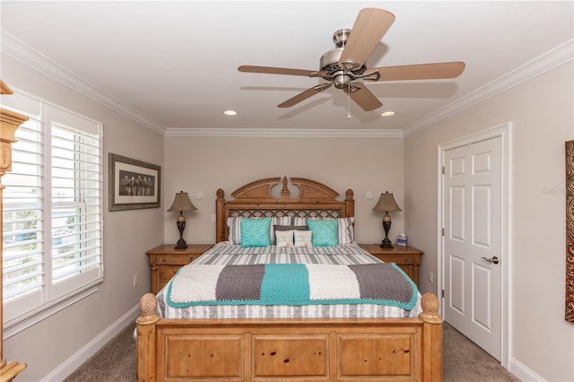 bedroom with carpet, baseboards, ceiling fan, and crown molding