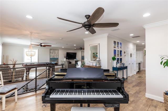 435 Jessamine Ave, New Smyrna Beach, FL 32169 - game room with ornamental molding, a ceiling fan, recessed lighting, light wood-type flooring, and baseboards