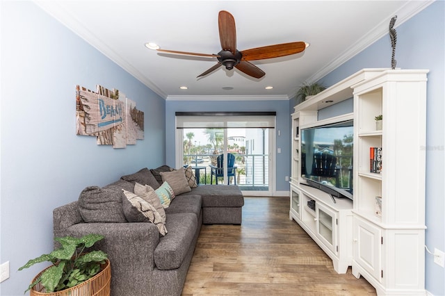 435 Jessamine Ave, New Smyrna Beach, FL 32169 - living room with ceiling fan, light wood-type flooring, recessed lighting, and ornamental molding