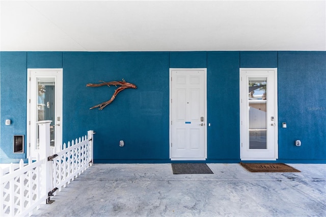 435 Jessamine Ave, New Smyrna Beach, FL 32169 - entrance to property featuring stucco siding