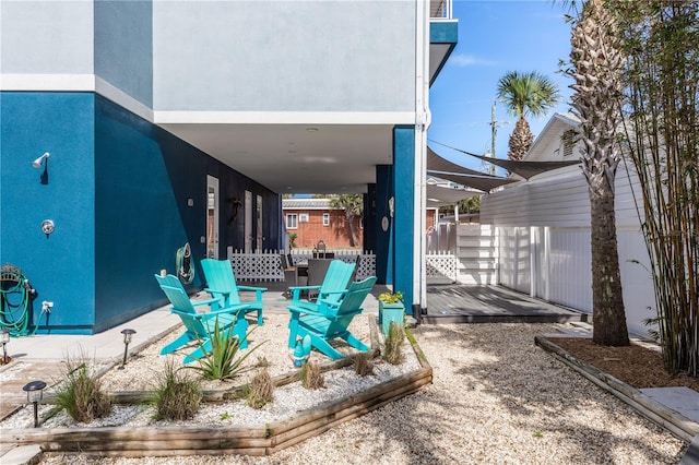 435 Jessamine Ave, New Smyrna Beach, FL 32169 - view of patio / terrace featuring a fire pit