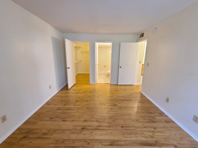 4034 Dream Oak Pl Unit 104, Tampa, FL 33613 - spare room featuring light hardwood / wood-style floors