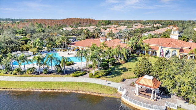 birds eye view of property featuring a water view