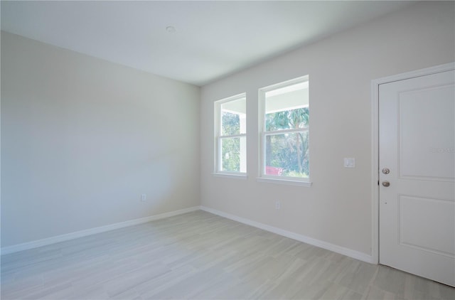 empty room featuring light hardwood / wood-style floors