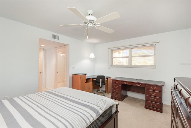 bedroom featuring ceiling fan and light carpet