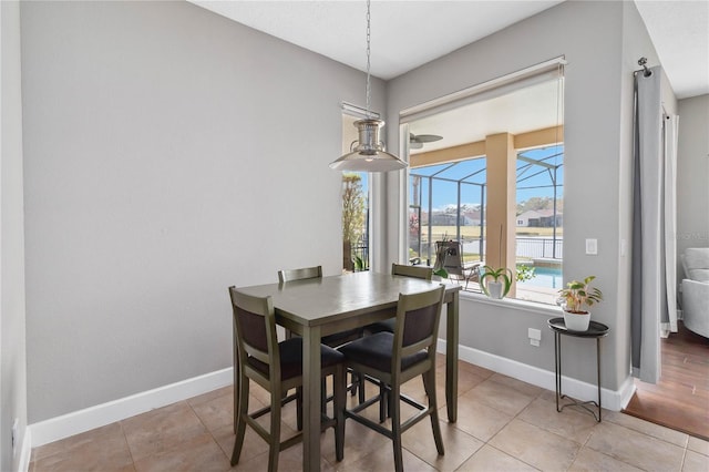 view of tiled dining space