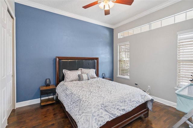 bedroom with multiple windows, a closet, crown molding, and dark hardwood / wood-style floors