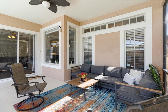 view of patio with outdoor lounge area and ceiling fan