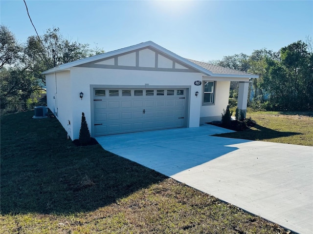 view of front of property with a garage and a front yard