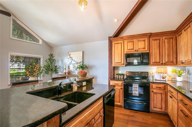2929 Lakeshore Dr, Mount Dora, FL 32757 - kitchen featuring black appliances, high vaulted ceiling, dark wood-style flooring, and brown cabinetry