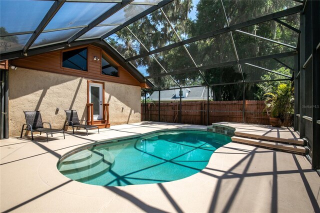 2929 Lakeshore Dr, Mount Dora, FL 32757 - view of swimming pool featuring a patio area, glass enclosure, and entry steps