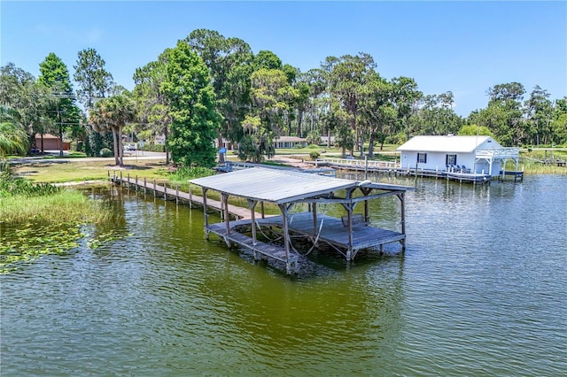 2929 Lakeshore Dr, Mount Dora, FL 32757 - dock area with a water view and view of wooded area