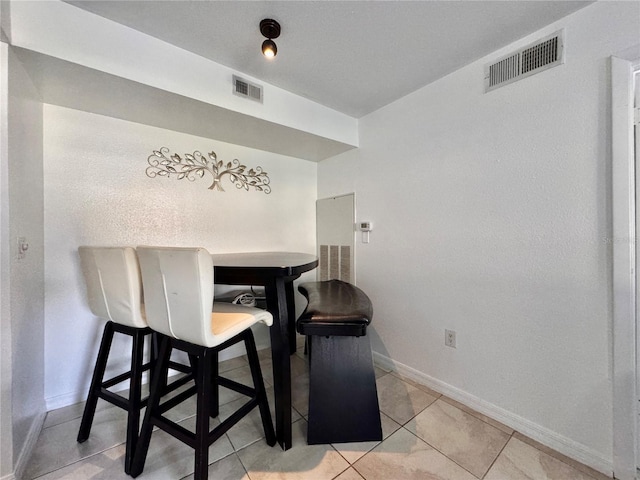 view of tiled dining space