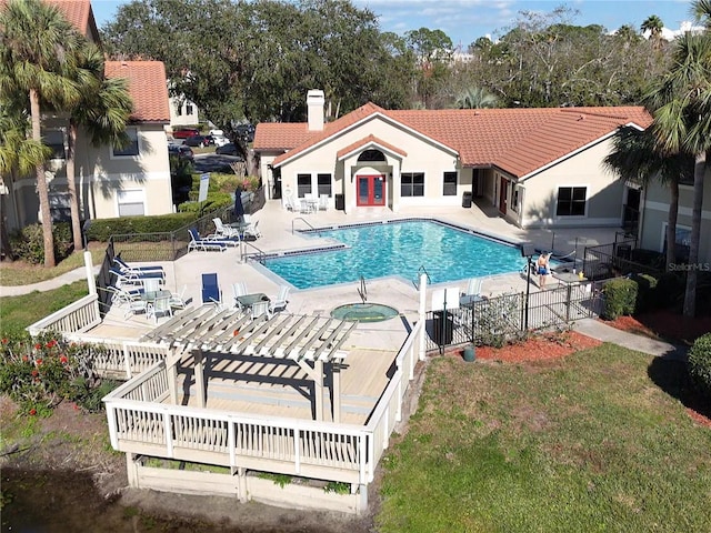 view of swimming pool with a pergola, a community hot tub, central air condition unit, and a patio area