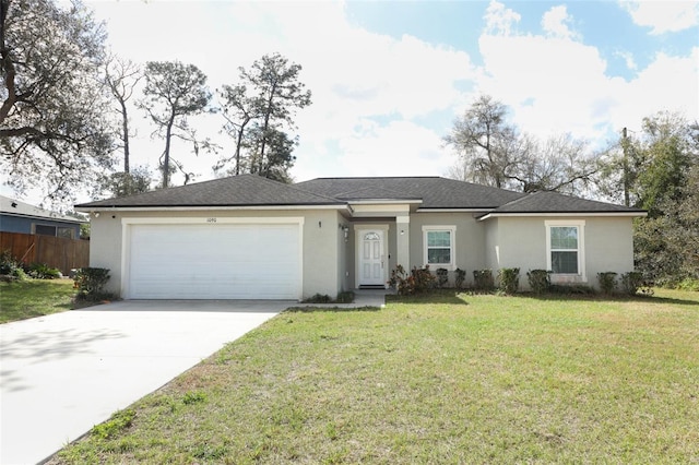 ranch-style home with a front lawn, fence, concrete driveway, stucco siding, and a garage