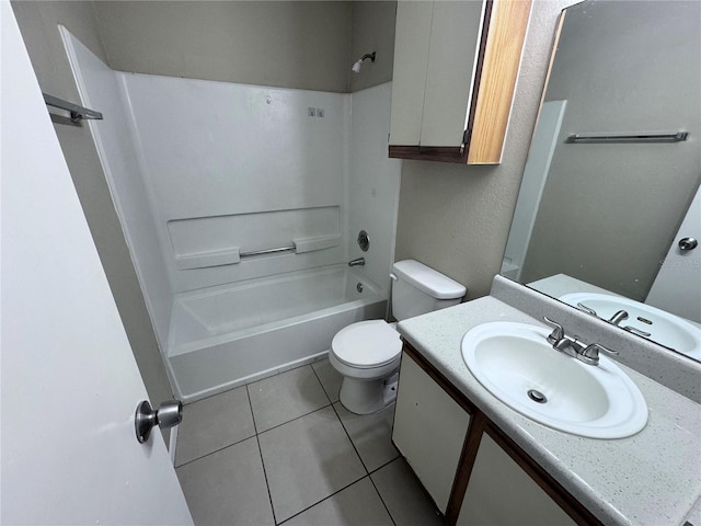 full bathroom featuring vanity, tile patterned floors, toilet, and shower / washtub combination