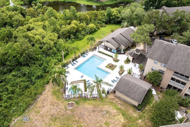 birds eye view of property featuring a water view