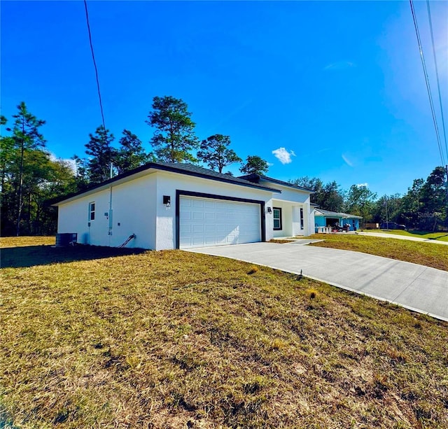 exterior space with a lawn and central air condition unit