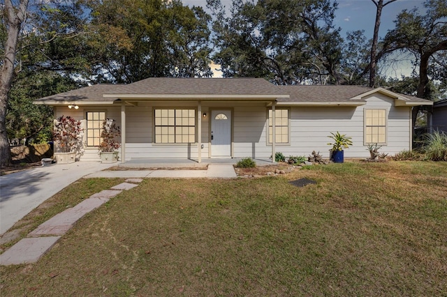 single story home featuring a front lawn and a porch