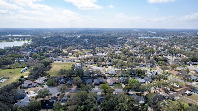 aerial view featuring a water view and a residential view