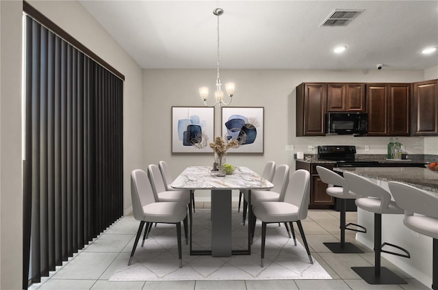 301 E Fiesta Key Loop, Deland, FL 32720 - dining room featuring a chandelier, visible vents, light tile patterned flooring, and recessed lighting